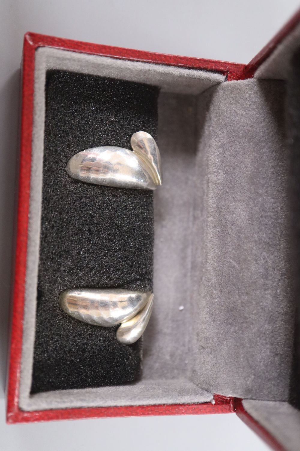 Kim Naver for Georg Jensen, a sterling silver heart ring, No. 320 and a pair of heart earrings by Isabell Kristensen for Jensen,